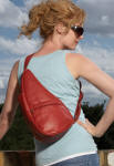 young woman with red leather ameribag