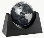 small black globe on wood base