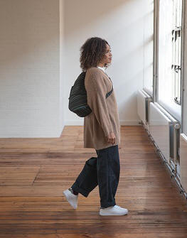 ameribag healthy back bag northern lights worn by woman