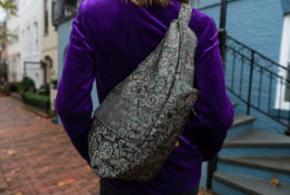 AmeriBag Small Healthy Back Bag Tote Black Fleur Prints worn by a woman