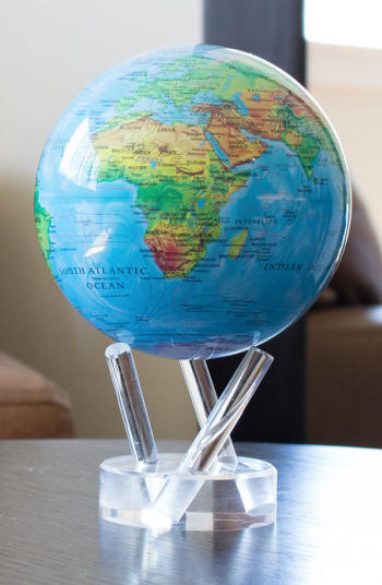 MOVA solar powered rotating world globe blue oceans releif cartography on clear base