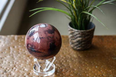 Mars solar power rotating globe with plant