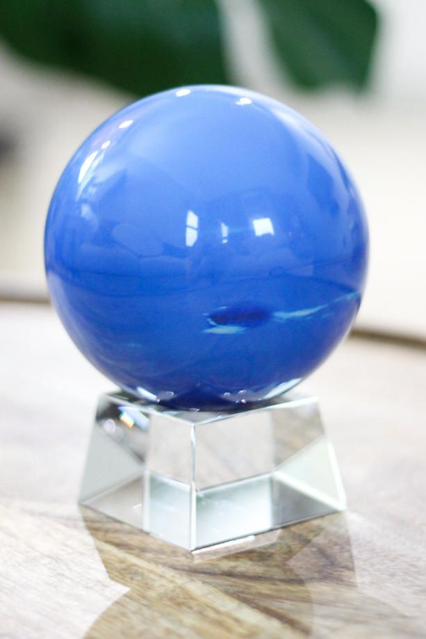 Neptune solar powered rotating globe on crystal base