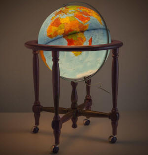 Monaco blue illuminated world globe on stand showing political boundaries