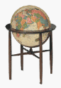 beige oceans world globe on wood floor stand