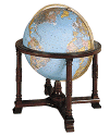 large illuminated world globe with blue oceans