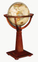 globe on wooden floor stand