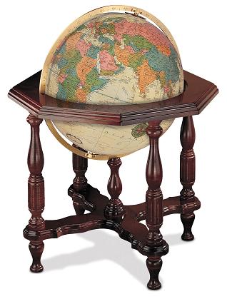 Large illuminated world globe on wood stand